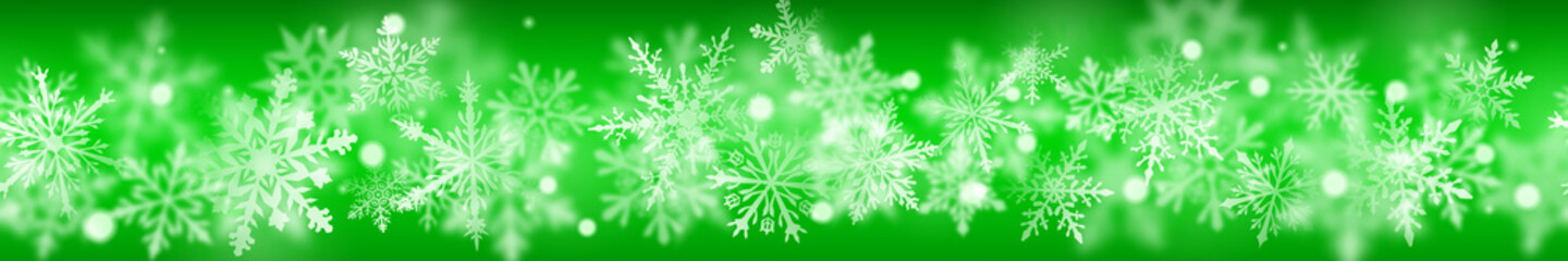 Christmas banner of complex blurred and clear snowflakes in white colors on green background. With horizontal repetition