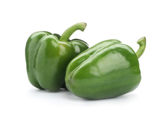 Obraz na płótnie Canvas Ripe green bell peppers on white background