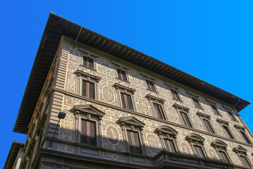 Roof of the old building against the blue sky