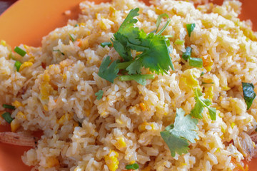 fried rice with crab and vegetable on plate 