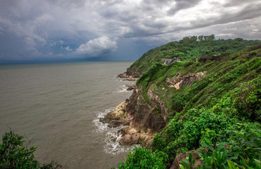Fototapeta premium Blurred wallpaper of nature by the sea, with the wind blowing through, rain storms passing through, the sky has black clouds covered, is a natural event