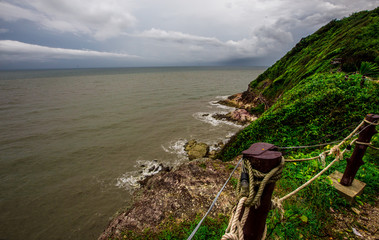 Blurred wallpaper of nature by the sea, with the wind blowing through, rain storms passing through,...