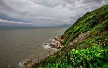 Blurred wallpaper of nature by the sea, with the wind blowing through, rain storms passing through, the sky has black clouds covered, is a natural event