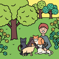 young man with cute cats mascots on the park