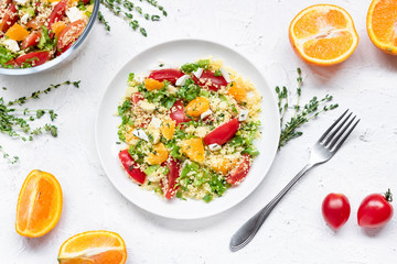 Healthy and simple food, light summer lunch, fragrant salad with couscous and oranges - obrazy, fototapety, plakaty