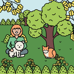 young woman with little dogs in the park