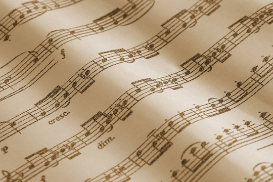 Vintage sheet music with notes selective focus