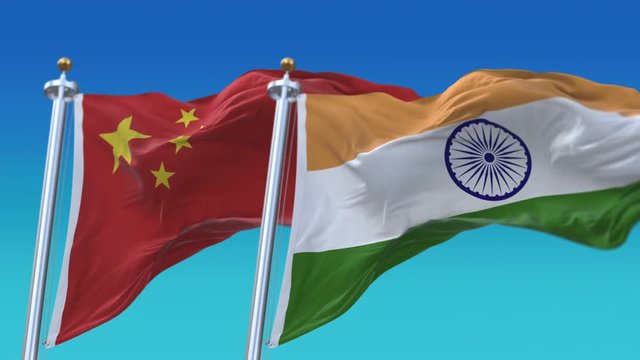 4k Seamless India and China Flags with blue sky background;A fully digital rendering;The animation loops at 20 seconds;IND IN CHN CN.
