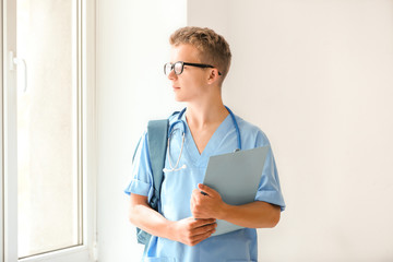 Portrait of male student in clinic