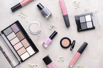 Set of decorative cosmetics on grey background