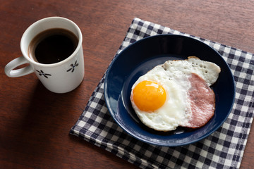 breakfast with fried eggs and coffee