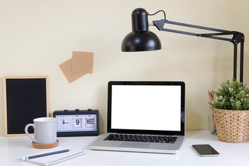 Workspace desk and mockup laptop. copy space and blank screen. Business image, Blank screen laptop and supplies.