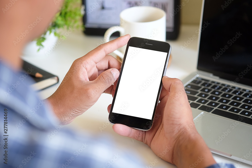 Poster cropped shot view of man hands holding smart phone with blank copy space screen for your text messag