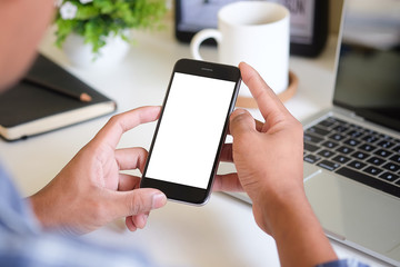 Cropped shot view of man hands holding smart phone with blank copy space screen for your text message or information content, female reading text message on cell telephone during in urban setting. 