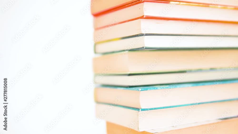 Poster books are at the stake. from slow and smooth movement to fast movement from the edge of the books to