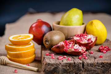 Fresh variety fruits from all seasons on a wood table