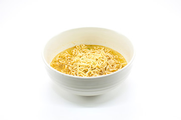 Famous asian instant noodles isolated in a ceramic bowl on white background. Horizontal shot.