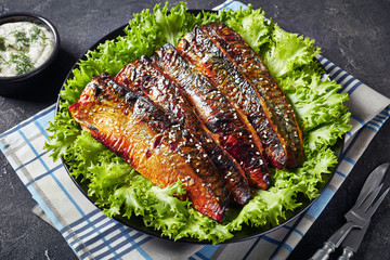 roasted fillets of mackerel fish with lettuce