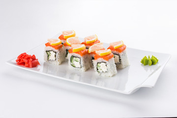 Philadelphia roll sushi with salmon, avocado, cream cheese Japanese food isolated on white background