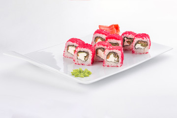 sushi roll with salmon, avocado, cream cheese and tobiko Japanese food isolated on white background