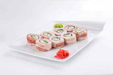 Japanese sushi roll with bacon and cheese isolated on white background