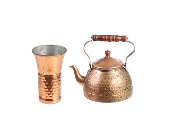 antique copper pot and cup isolated on white background