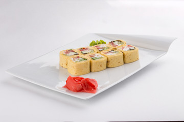 Mexico Maki Sushi Roll made of tomato, Cream Cheese, Cucumber and Tortilla isolated on white background