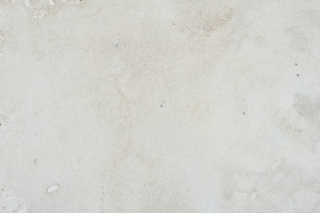 Texture of a concrete wall with cracks and scratches which can be used as a background