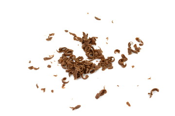 Grated chocolate. Heap of ground chocolate isolated on white background with clipping path, closeup.