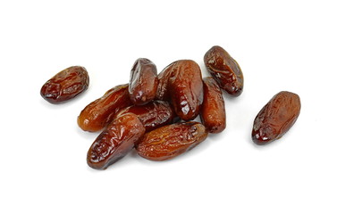 Dried dates over white background. Heap of dried dates isolated on white background.