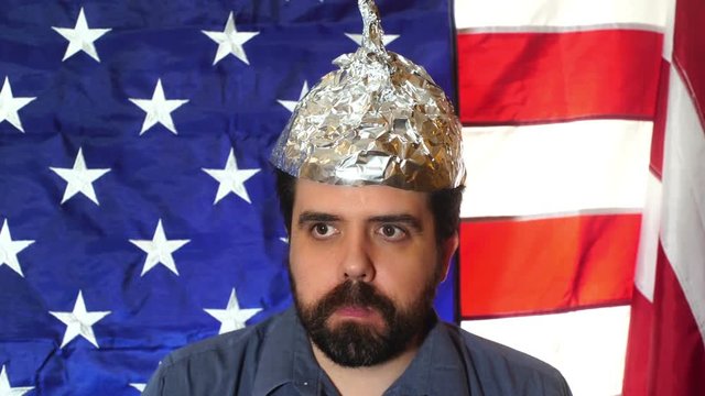 paranoid american with tinfoil hat