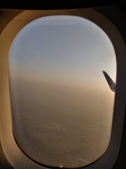 Fototapeta premium wing of the flight during travel in the flight near the window