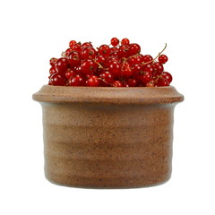 Red currants in a bowl isolated on white background