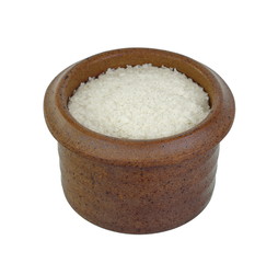 Instant potato puree flakes in a bowl isolated on white.