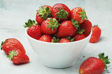 A bowl with ripe bright strawberry