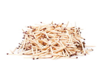 Heap of wooden matches with a sulfur head