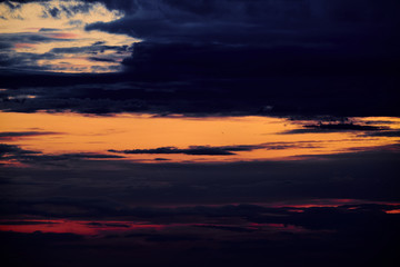 Fototapeta na wymiar Beautiful sunset - dark sky with clouds and sunlight