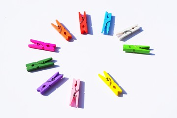A clothespin  or clothes peg is a fastener used to hang up clothes for drying, usually on a clothes line. Clothespins often come in many different designs