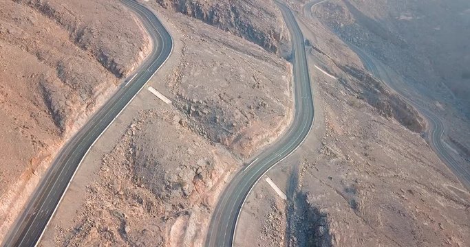 Desert mountain road on Jebel Jais mountain in the United Arab Emirates aerial view