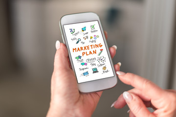 Fototapeta na wymiar Marketing plan concept on a smartphone
