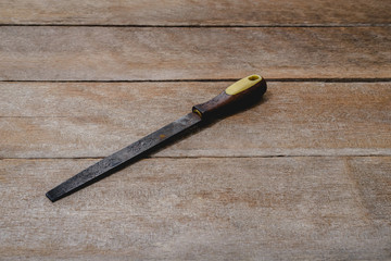 old rasp on wooden