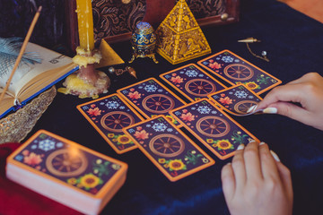 Mystical atmosphere of tarot card on the table, esoteric concept, fortune telling and predictions 