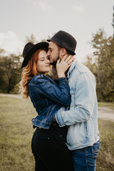 Happy loving couple outdoor in park .