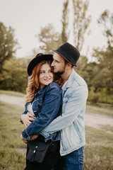 Fototapeta premium Happy loving couple outdoor in park .