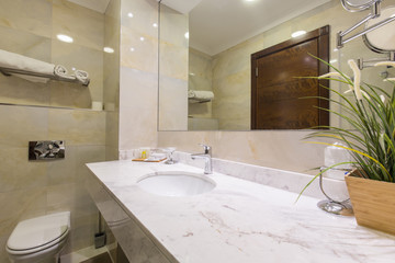 Hotel bathroom interior with shower cabin