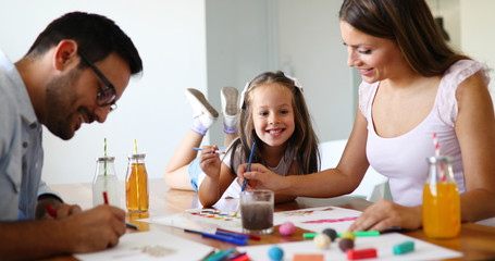 Happy familiy spending fun time at home