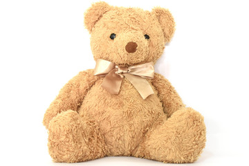 Brown teddy bear on a white background