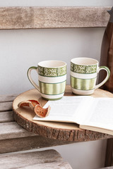 Close up of a cup of tea on the wooden table. Ma toom tea