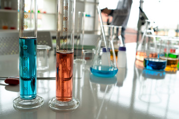 Glass tubes, many test tubes in the laboratory which contain various colors of liquid