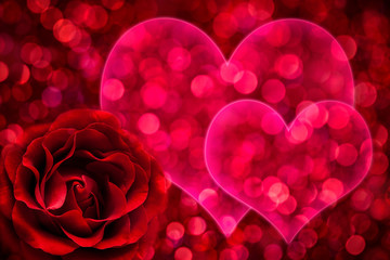 Red rose on bokeh background with pink shape of two hearts, valentine day and love concept.